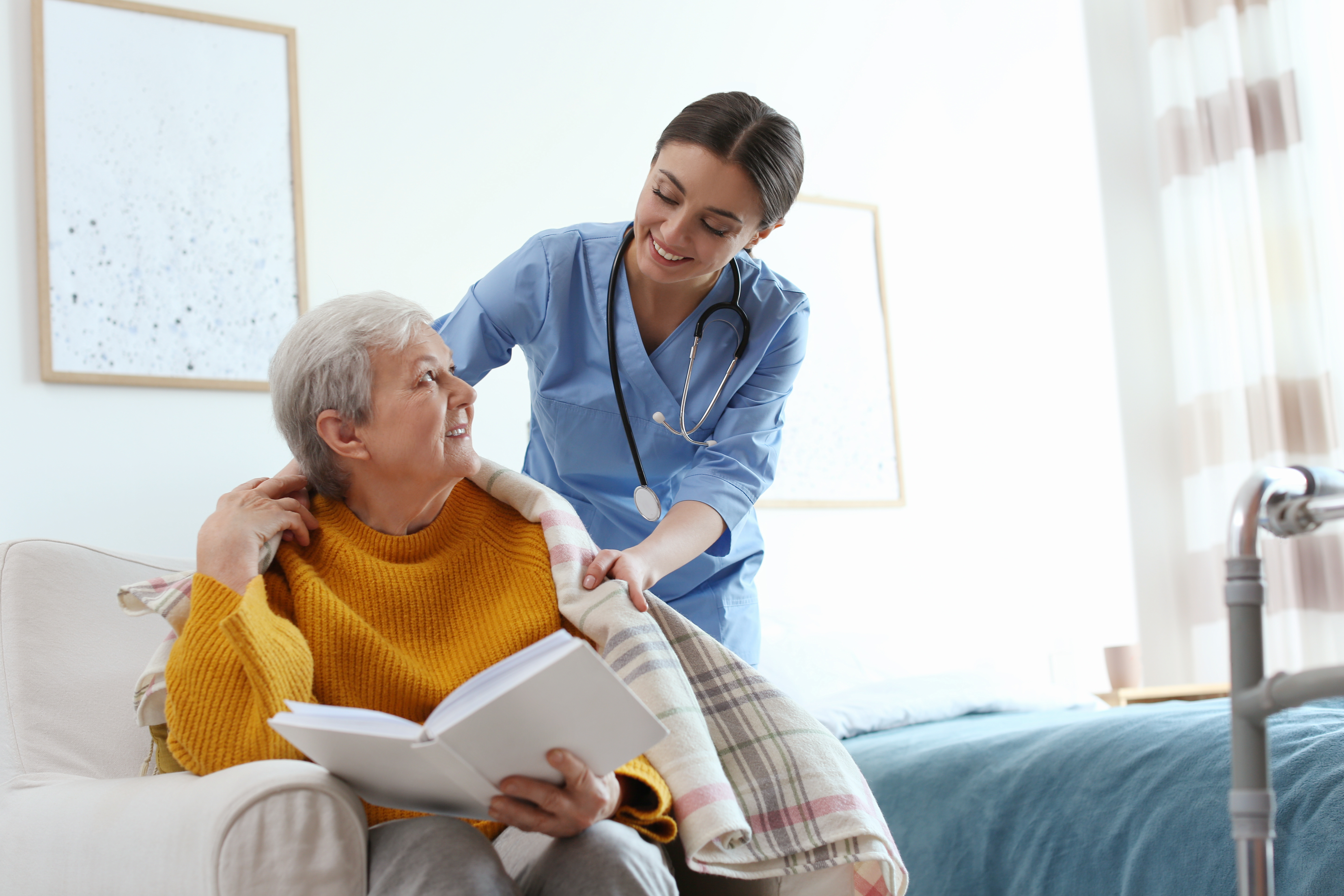 Hospice nurse with patient
